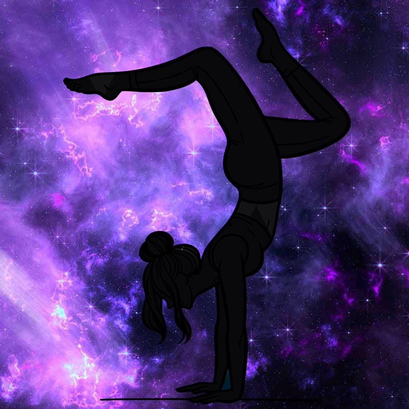 a woman doing a handstand