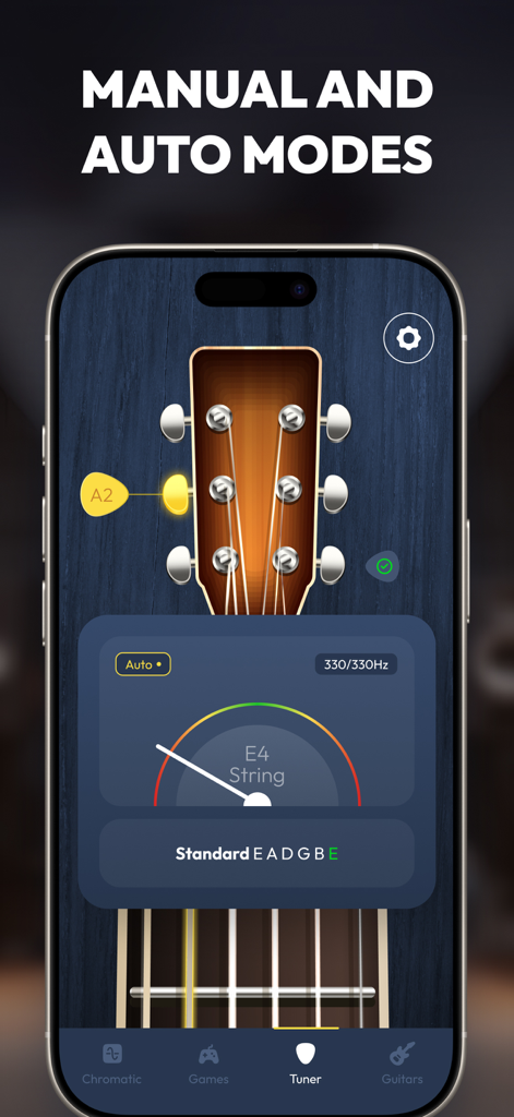 Guitar Tuner: Bass & Fender - Smartphone screen showing a guitar tuner app with manual and auto modes and a visual headstock guide