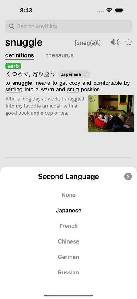 Deep Dictionary - Deep Dictionary mobile app interface showing the definition and Japanese translation for the word snuggle with a second language selector menu.
