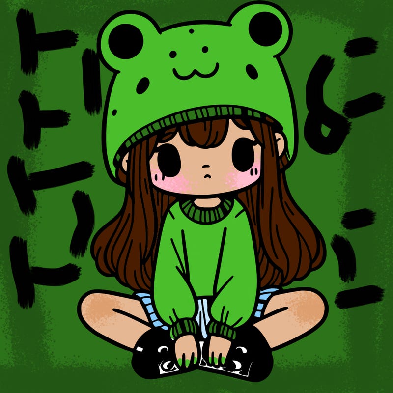 a girl wearing a frog hat and some frog socks