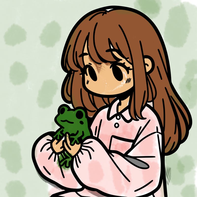 girl with long hair and a oversized shirt. and she is holding a frog