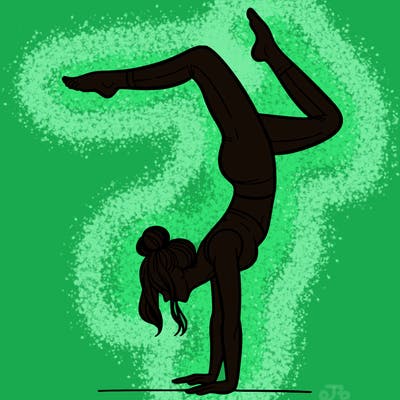 a woman doing a handstand