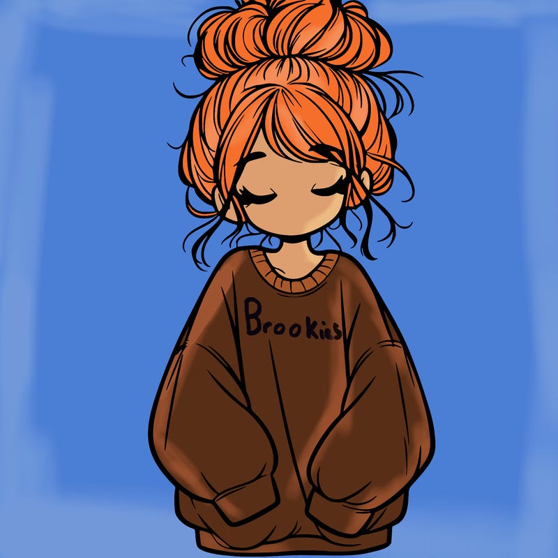 girl with baggy sweatshirt and messy bun
