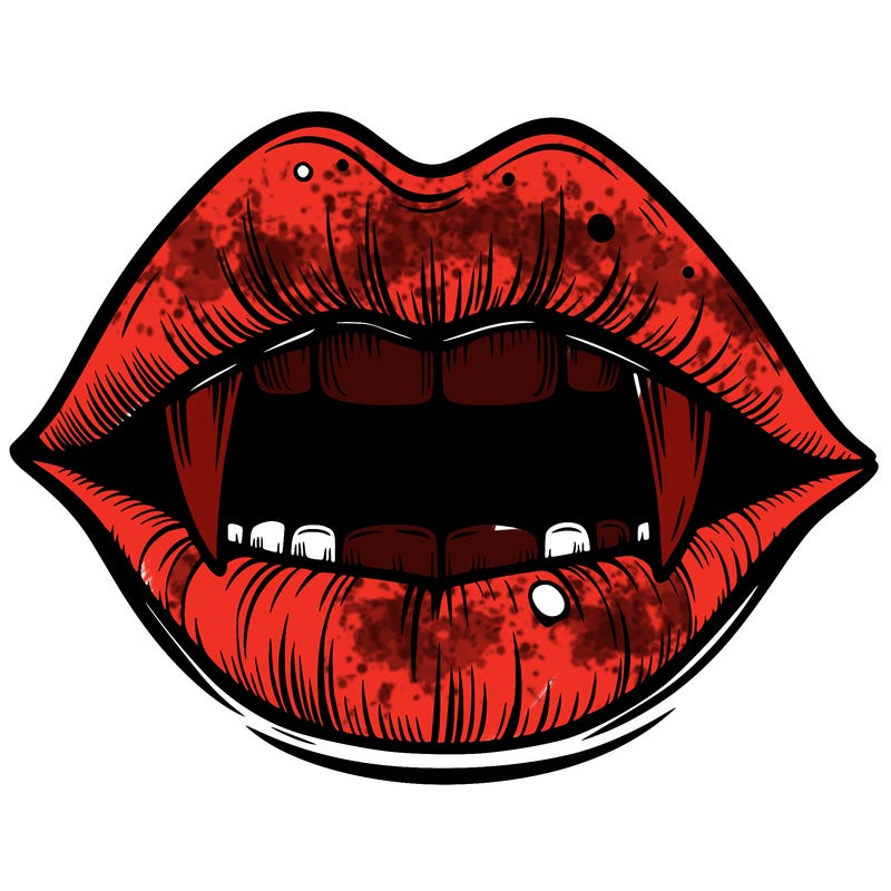 lips with vampire teeth