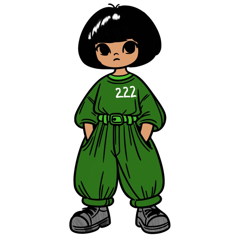 girl in baggy top and pants and short hair