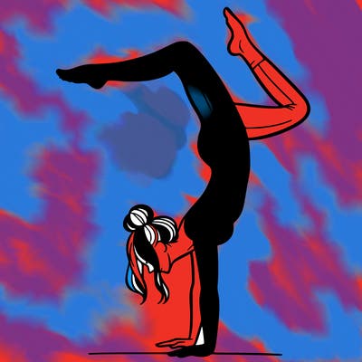 a woman doing a handstand