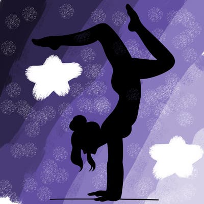 a woman doing a handstand