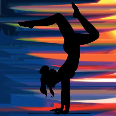 a woman doing a handstand