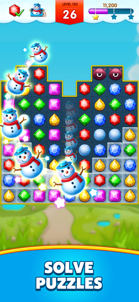 Jewel Legend - Jugabilidad de Jewel Legend mostrando gemas coloridas y muñecos de nieve animados en un nivel de puzzle match-3
