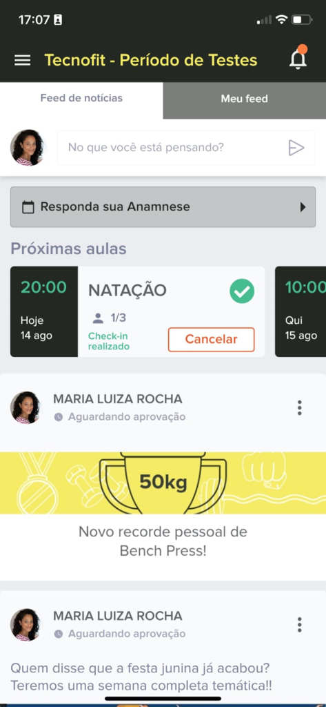 Dashboard of the Tecnofit app showing a social news feed and upcoming fitness classes