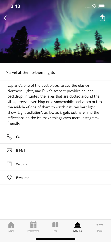 Pantalla de la aplicación móvil TUI Santa Trips que muestra información sobre cómo ver la Aurora Boreal en Laponia.