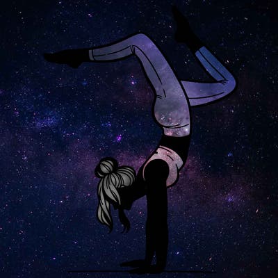 a woman doing a handstand