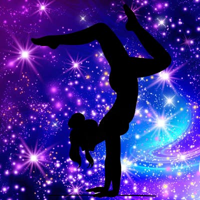 a woman doing a handstand