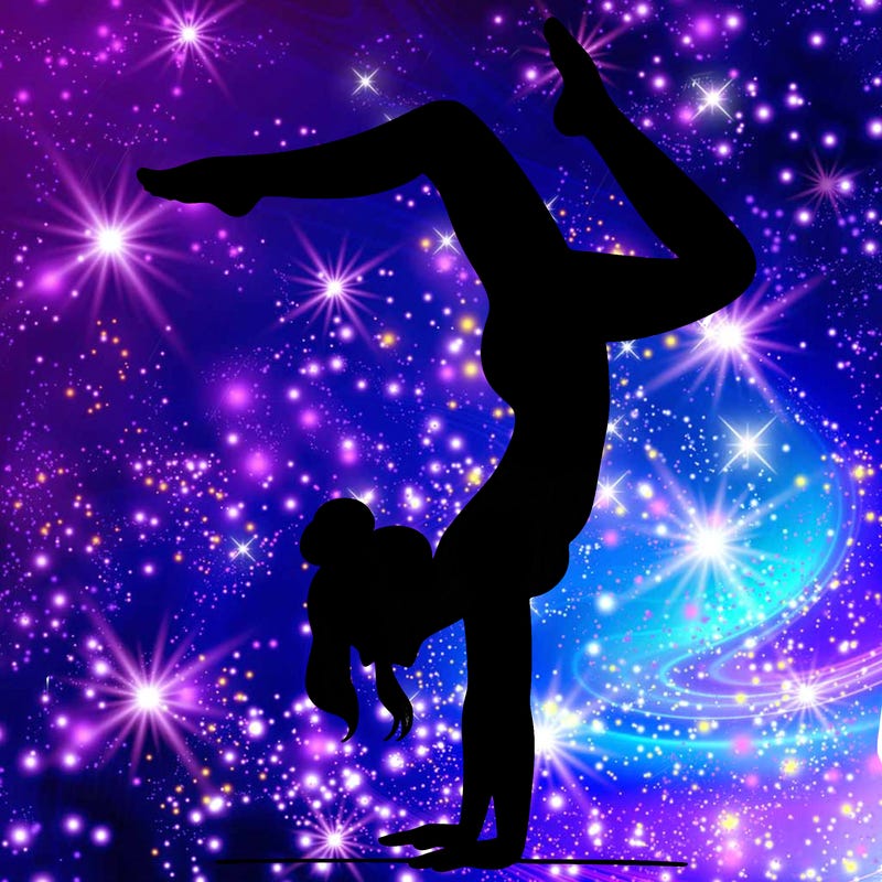 a woman doing a handstand