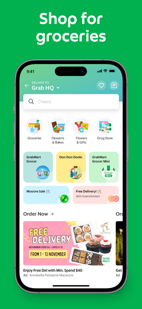 The grocery shopping and delivery interface of the Grab app showing various categories and store options.