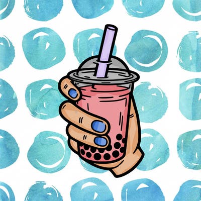 a hand holding boba tea