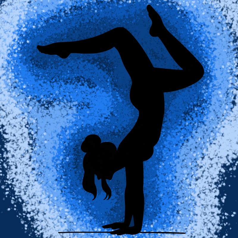 a woman doing a handstand