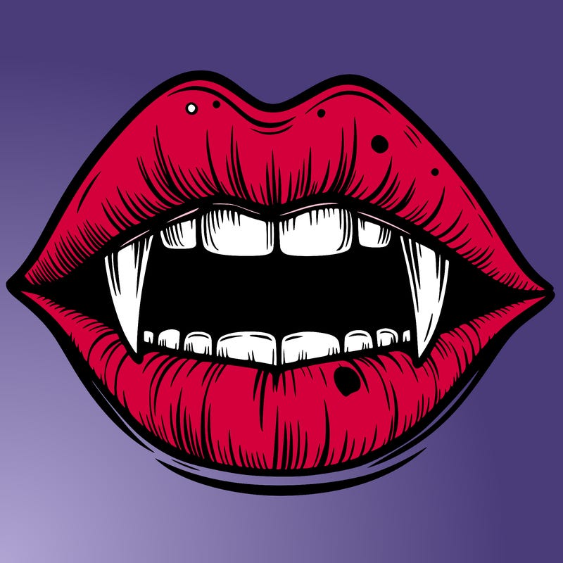lips with vampire teeth
