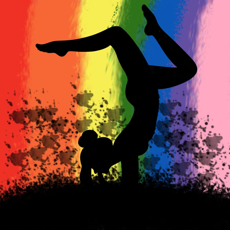 a woman doing a handstand