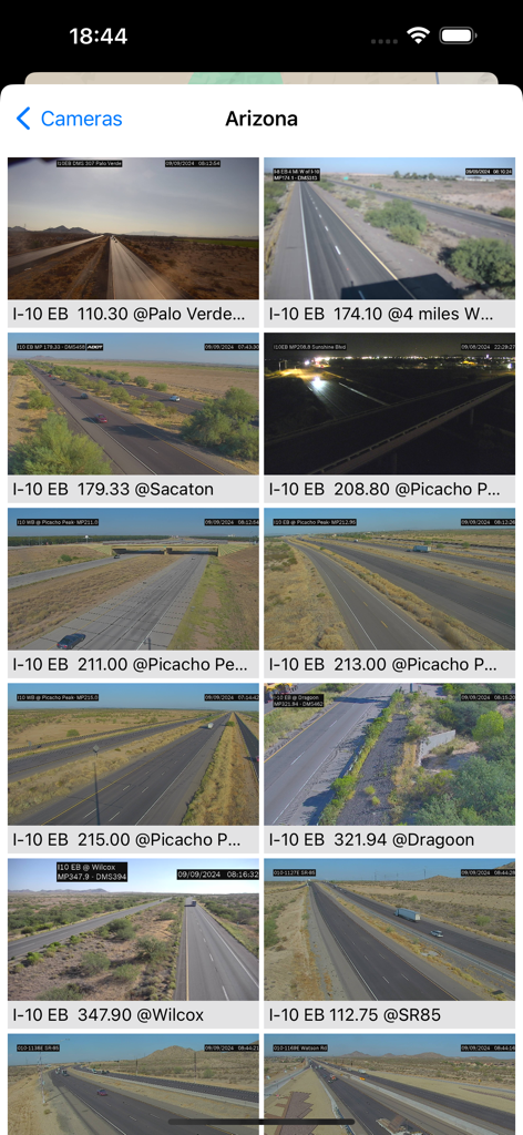 Grid view of live traffic camera feeds from Arizona highways within the USA Traffic Cameras app.