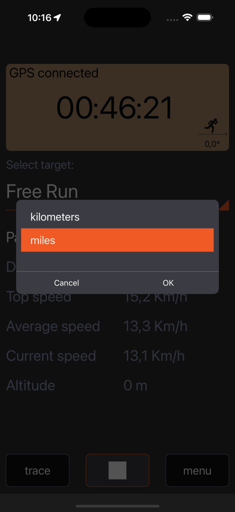 Ein Menübildschirm in der Jogging App, auf dem Benutzer zwischen Kilometern und Meilen für die Distanzverfolgung wählen können.