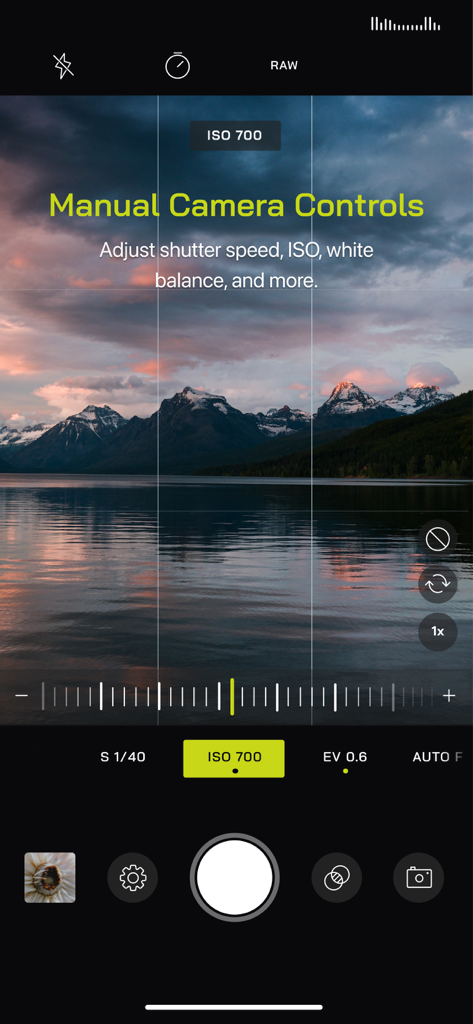 Pro Camera by Moment - User interface of Pro Camera by Moment showing manual exposure and ISO controls over a landscape photo of mountains and a lake at sunset.