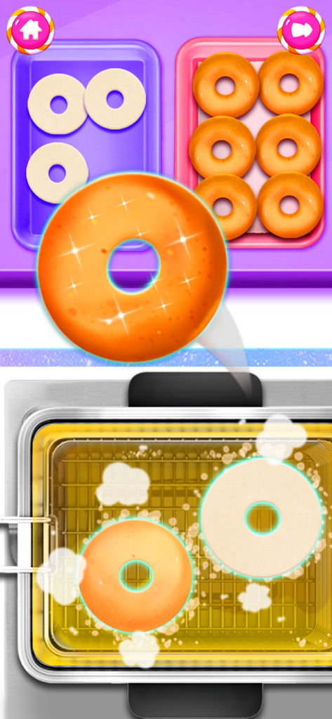 Food Cooking Baking Girl Games - A girl's cooking game showing donuts being deep fried and prepared on trays.