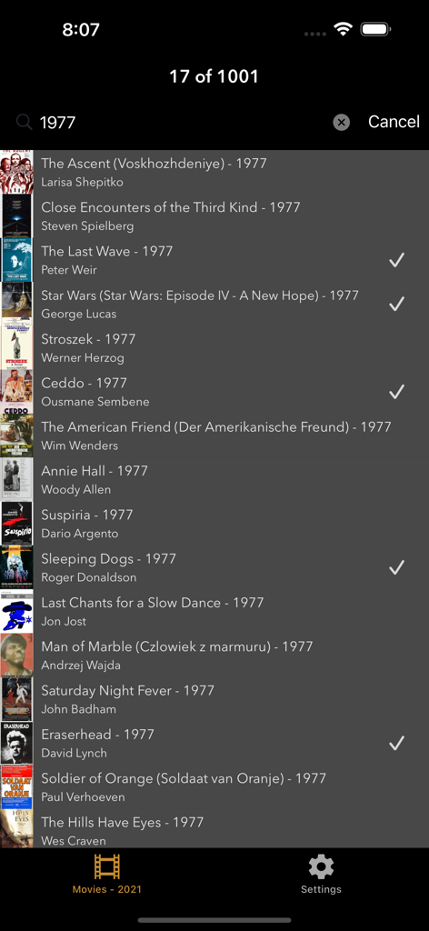 A checklist of essential films from 1977 in the 1001 Movies app showing titles like Star Wars and Annie Hall with checkmarks for watched items
