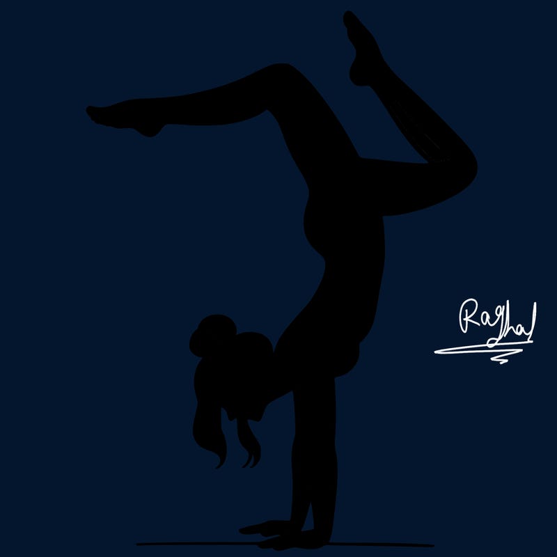 a woman doing a handstand