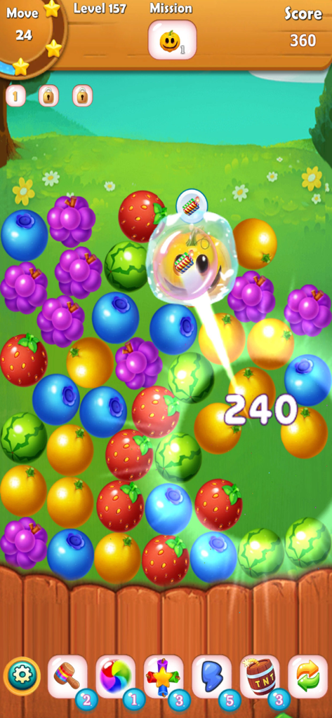 Fruit Link - Line Blast - Gameplay coloré de Fruit Link Line Blast montrant un plateau de puzzle de fruits avec des power-ups et une mission citrouille