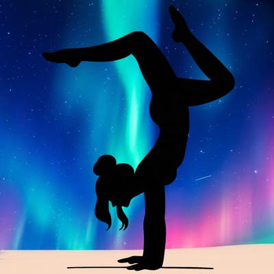 a woman doing a handstand