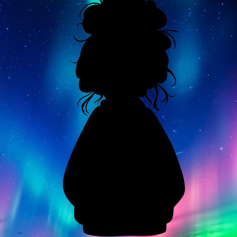 girl with baggy sweatshirt and messy bun