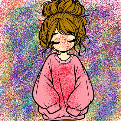 girl with baggy sweatshirt and messy bun