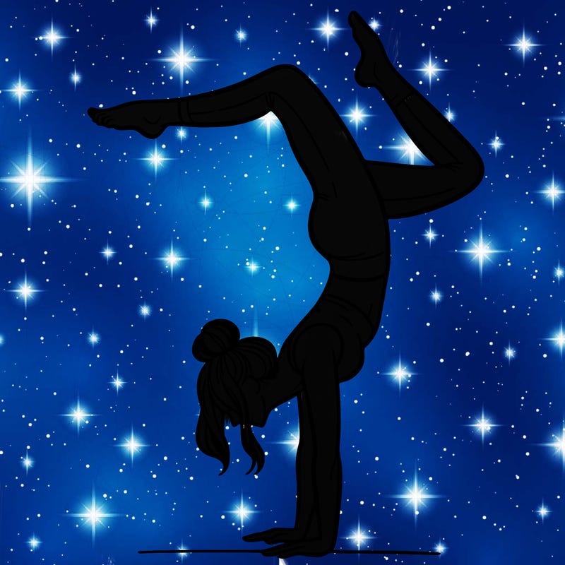 a woman doing a handstand