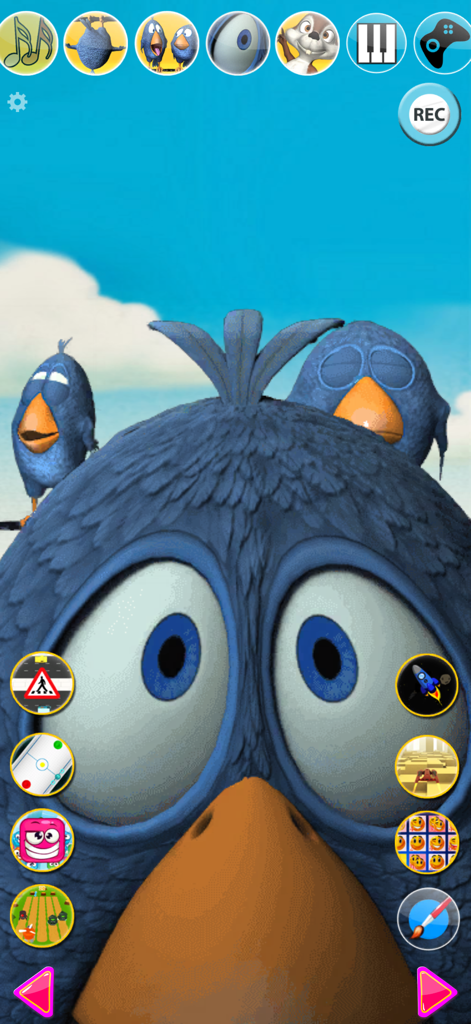 Talking Birds On A Wire - A funny blue bird character with large eyes surrounded by colorful game icons