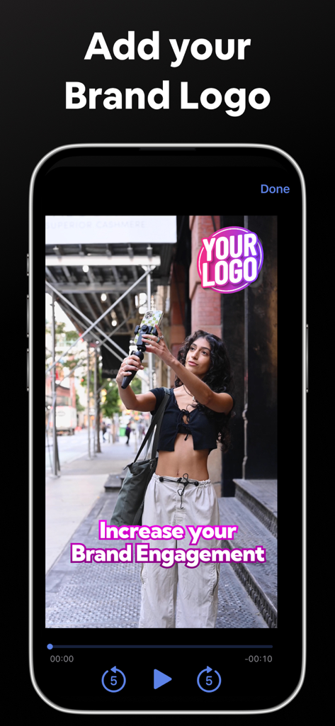 AI Captions for Videos: VidCap - Mobile app interface showing how to add a custom brand logo and pink captions to a video of a creator filming on a city street