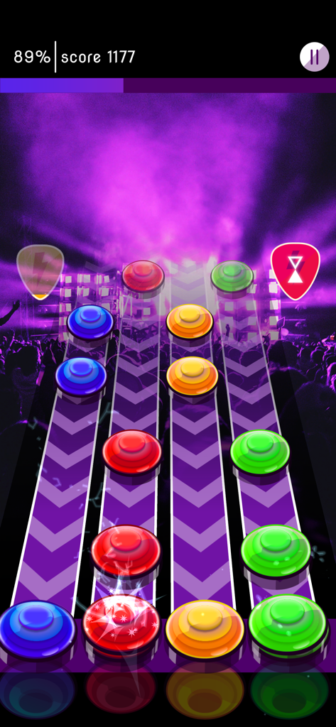 The Best Electric Guitar - コンサートステージの背景の上にトラックを滑り降りるカラフルなノートが表示された、エレキギターリズムシミュレーターのゲームプレイ。