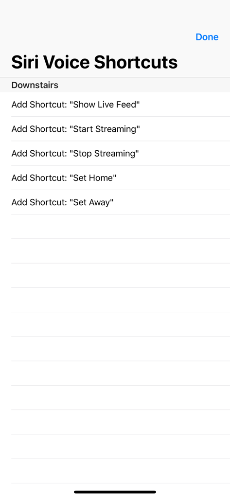 Una lista de opciones de atajos de voz de Siri para controlar cámaras Nest, que incluye mostrar transmisión en vivo y establecer el estado en casa o ausente