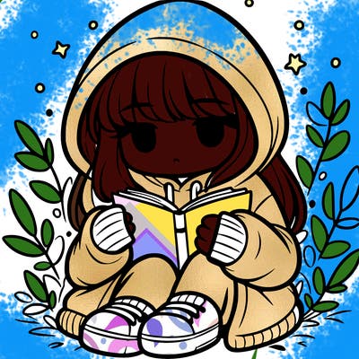 girl in oversized hoodie reading a book