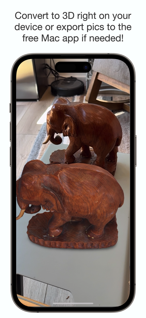 Sapling 3DスキャナーLiDARアプリを使用して、2つの木製象の彫刻をキャプチャし、3Dに変換しているiPhone画面。