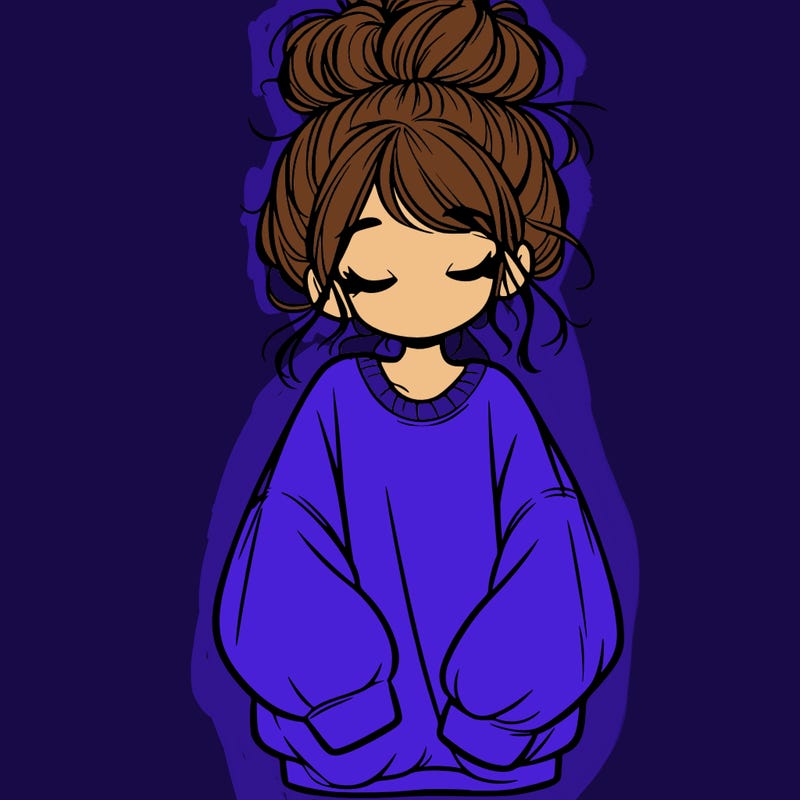 girl with baggy sweatshirt and messy bun