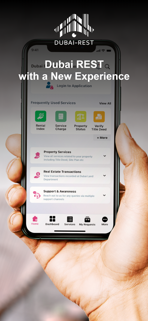 Hand holding a smartphone displaying the Dubai REST real estate services home screen