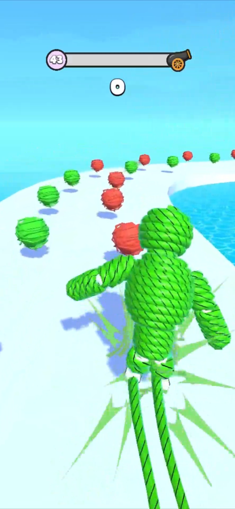 Rope Man: Monster Battle Run - Un personaje Rope Man verde corriendo por un camino y recogiendo ovillos de hilo.