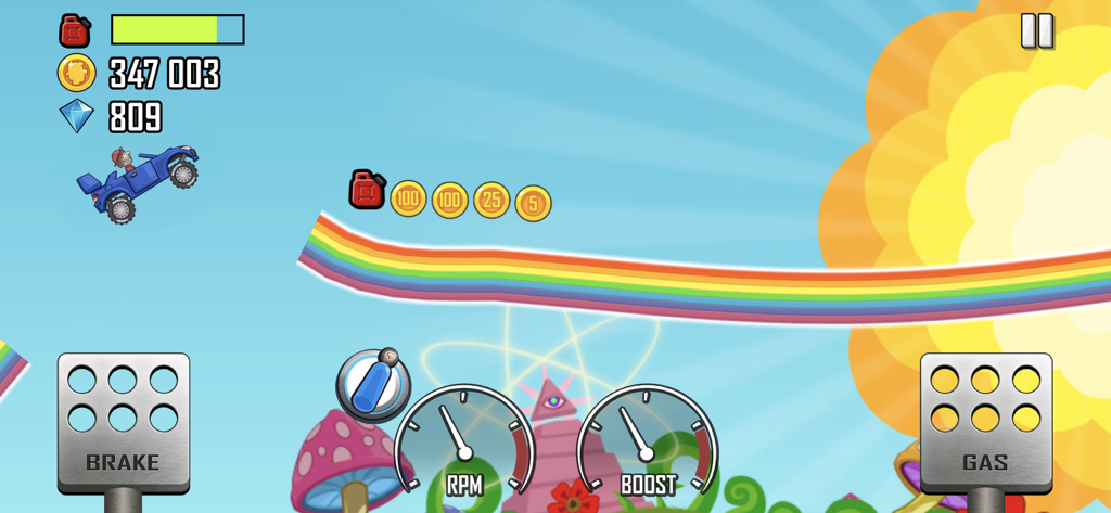 Hill Climb Racing - Ein blaues Fahrzeug springt in Hill Climb Racing über eine Regenbogenstraße