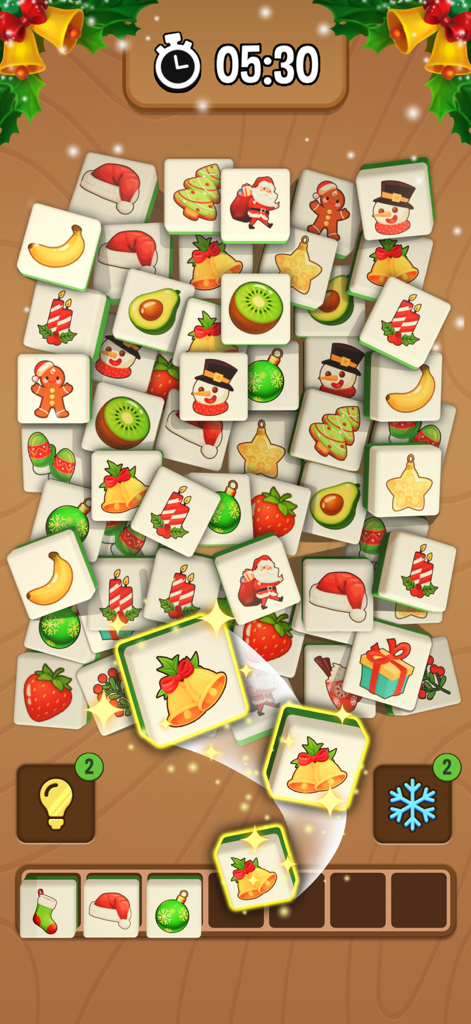 Tile Triple 3D - A Christmas themed level in Tile Triple 3D showing various festive and fruit tiles being matched