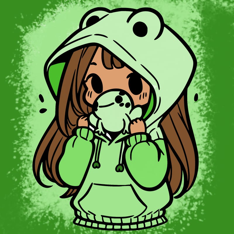 a girl holding a froggy hoodie