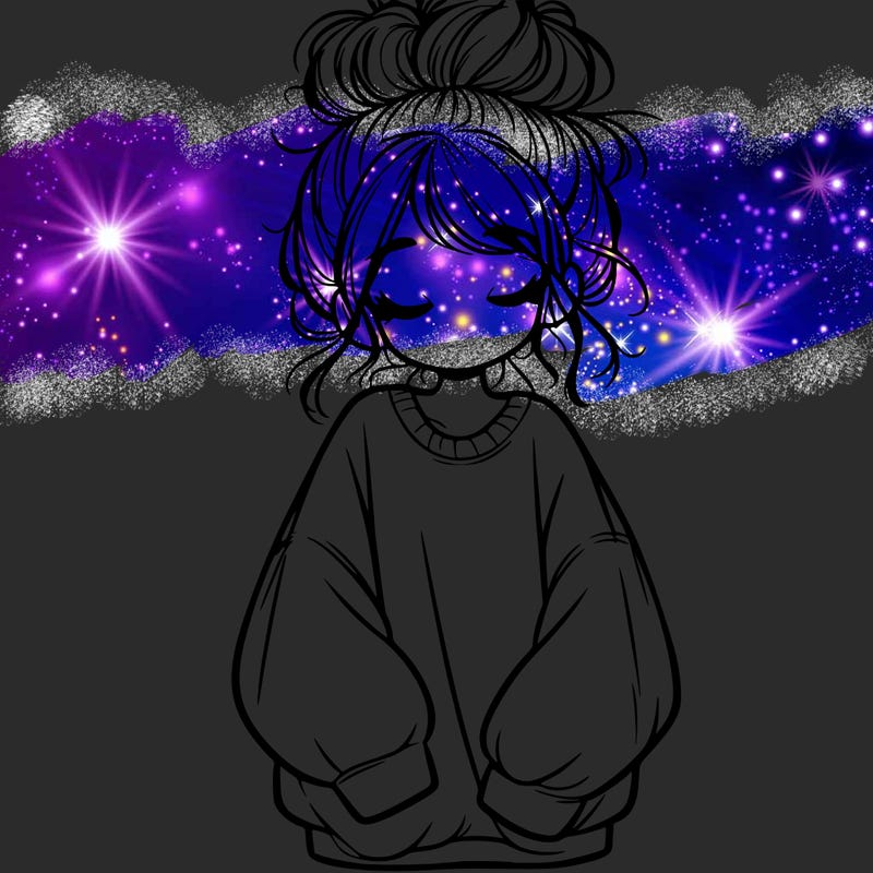 girl with baggy sweatshirt and messy bun