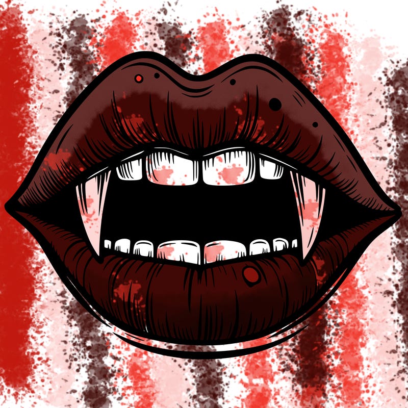 lips with vampire teeth