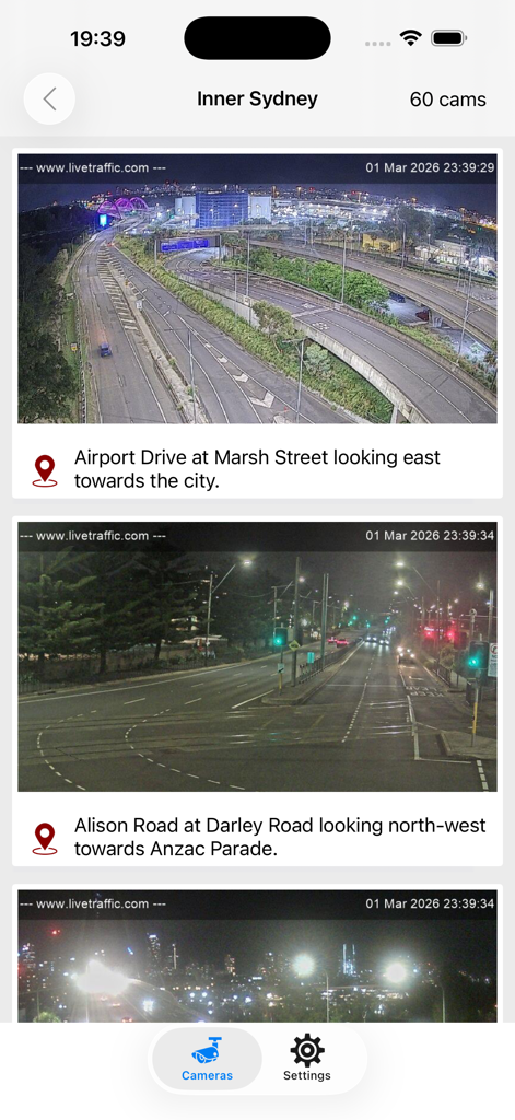 Interface of Traffic Cameras Australia app showing a list of live road camera feeds for Inner Sydney at night