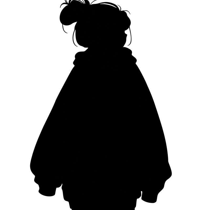 realistic girl with a oversized sweatshirt on and a bun